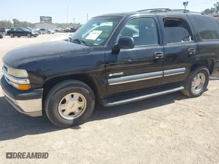 2003 Chevrolet Tahoe LT with VIN 1GNEC13Z03R318933, listed as a IAAI auction lot 41828148 with 192,851 mi miles. Bid and sale history available at carsss.com. Image 2.