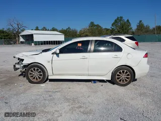 2010 Mitsubishi Lancer ES with VIN JA32U2FU0AU033365, listed as a IAAI auction lot 41671843 with 157,905 mi miles. Bid and sale history available at carsss.com. Image 14.
