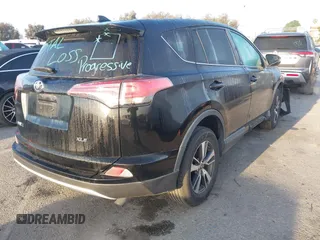 2018 Toyota RAV4 XLE with VIN 2T3WFREV2JW483635, listed as a IAAI auction lot 41856177 with 94,710 mi miles. Bid and sale history available at carsss.com. Image 4.