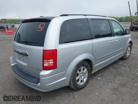 2010 Chrysler Town & Country Touring with VIN 2A4RR5D14AR271397, listed as a IAAI auction lot 42181231 with 200,547 mi miles and . Bid and sale history available at DreamBid. Image 4.