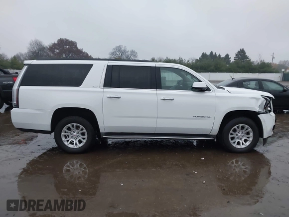 2015 GMC Yukon XL SLT with VIN 1GKS1HKC7FR223513, listed as a IAAI auction lot 40822575 with 128,239 mi miles. Bid and sale history available at carsss.com. Image 13.