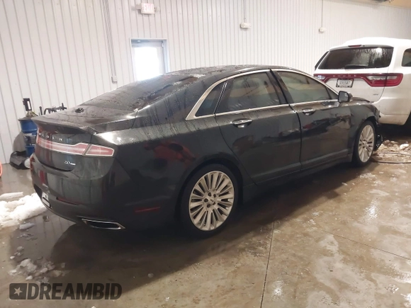 2014 Lincoln MKZ with VIN 3LN6L2G93ER800523, listed as a IAAI auction lot 41296957 with 140,136 mi miles. Bid and sale history available at carsss.com. Image 4.
