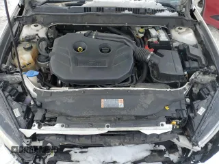 2015 Ford Fusion SE z VIN 3FA6P0H94FR224427, wystawiony jako Copart lot #45850675 z przebiegiem 186 601 mil mil oraz Nie do naprawy • Non repairable. Historia ofert i sprzedaży dostępna na DreamBid. Obrazek 11.
