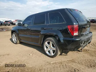2008 Jeep Grand Cherokee SRT-8 with VIN 1J8HR78308C174606, listed as a Copart auction lot 70313584 with 169,765 mi miles and Salvage Title. Bid and sale history available at carsss.com. Image 2.