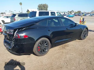 2020 Tesla Model S Long Range with VIN 5YJSA1E24LF381878, listed as a IAAI auction lot 41965340 with 47,468 mi miles. Bid and sale history available at carsss.com. Image 4.