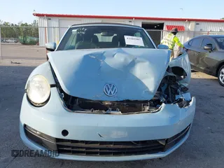 2013 Volkswagen Beetle 2.5L with VIN 3VW5P7AT0DM812482, listed as a IAAI auction lot 42103987 with 105,513 mi miles and . Bid and sale history available at DreamBid. Image 13.