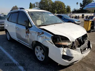 2009 Kia Rondo LX with VIN KNAFG529X97273401, listed as a Copart auction lot 75829094 with 171,062 mi miles and Salvage Title. Bid and sale history available at carsss.com. Image 4.