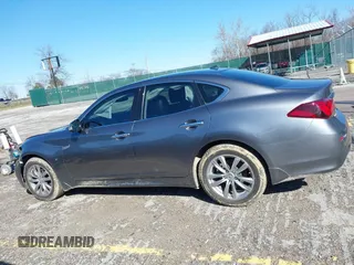 2018 Infiniti Q70 Luxe with VIN JN1BY1AR3JM220783, listed as a IAAI auction lot 41480241 with 95,739 mi miles and . Bid and sale history available at DreamBid. Image 14.