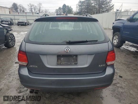 2010 Volkswagen Jetta S with VIN 3VWKZ7AJ2AM623887, listed as a Copart auction lot 84193724 with 148,275 mi miles and Salvage title. Bid and sale history available at DreamBid. Image 6.