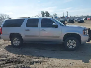 2013 Chevrolet Suburban LS z VIN 1GNWKLEGXDR305591, wystawiony jako IAAI lot #41785334 z przebiegiem 203 613 mil mil oraz . Historia ofert i sprzedaży dostępna na DreamBid. Obrazek 13.