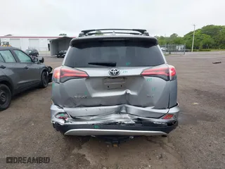 2016 Toyota RAV4 XLE with VIN 2T3WFREV5GW309468, listed as a IAAI auction lot 41973896 with 100,911 mi miles. Bid and sale history available at carsss.com. Image 16.