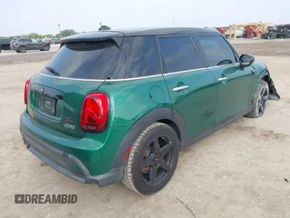 2022 MINI Hardtop 4 Door Cooper z VIN WMW33DK04N2P84250, wystawiony jako IAAI lot #42059692 z przebiegiem 34 238 mil mil oraz . Historia ofert i sprzedaży dostępna na DreamBid. Obrazek 4.