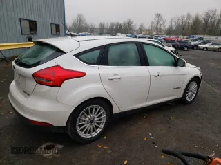 2015 Ford Focus Electric z VIN 1FADP3R41FL232835, wystawiony jako Copart lot #70969312 z przebiegiem 39 606 mil mil oraz . Historia ofert i sprzedaży dostępna na DreamBid. Obrazek 3.