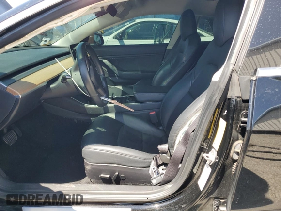 2019 Tesla Model 3 Mid Range z VIN 5YJ3E1EA9KF314143, wystawiony jako Copart lot #53564335 z przebiegiem 77 168 mil mil oraz Szkoda całkowita • Salvage title. Historia ofert i sprzedaży dostępna na DreamBid. Obrazek 7.