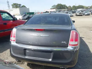 2013 Chrysler 300 C with VIN 2C3CCAKT2DH567348, listed as a IAAI auction lot 41909284 with 110,710 mi miles and . Bid and sale history available at DreamBid. Image 16.
