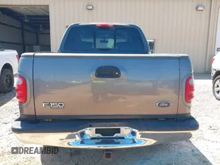 2003 Ford F-150 XLT with VIN 1FTRW08L83KC00394, listed as a IAAI auction lot 41998367 with 235,868 mi miles. Bid and sale history available at carsss.com. Image 16.