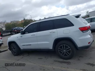 2018 Jeep Grand Cherokee Trailhawk with VIN 1C4RJFLT2JC137793, listed as a IAAI auction lot 41697299 with 149,100 mi miles and . Bid and sale history available at DreamBid. Image 14.