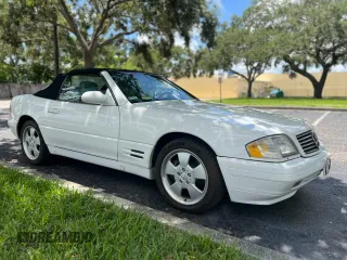 1999 Mercedes-Benz SL 500 with VIN WDBFA68F3XF176839, listed as a Copart auction lot 64512405 with 101,897 mi miles and Clean title. Bid and sale history available at DreamBid. Image 1.