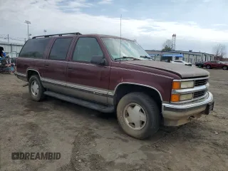 1999 Chevrolet Suburban z VIN 1GNFK16R2XJ328550, wystawiony jako Copart lot #53179525 z przebiegiem 170 914 mil mil oraz Czysty tytuł • Clean title. Historia ofert i sprzedaży dostępna na DreamBid. Obrazek 4.