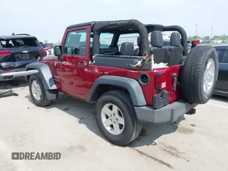 2013 Jeep Wrangler Sport z VIN 1C4GJWAG0DL543850, wystawiony jako IAAI lot #42374916 z przebiegiem 163 977 mil mil oraz . Historia ofert i sprzedaży dostępna na DreamBid. Obrazek 3.