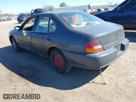 1999 Nissan Altima XE with VIN 1N4DL01D0XC116467, listed as a IAAI auction lot 41705684 with 227,999 mi miles. Bid and sale history available at carsss.com. Image 3.