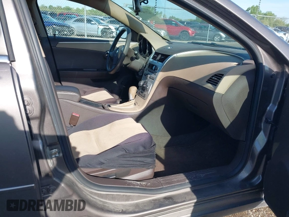 2012 Chevrolet Malibu 1LS with VIN 1G1ZB5E01CF193292, listed as a IAAI auction lot 42146689 with 240,073 mi miles and . Bid and sale history available at DreamBid. Image 5.