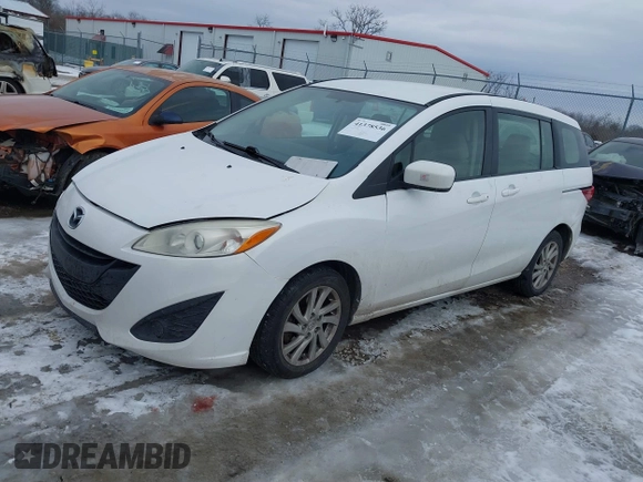 2012 Mazda 5 Sport z VIN JM1CW2BL6C0124440, wystawiony jako IAAI lot #41378536 z przebiegiem 157 262 mil mil oraz . Historia ofert i sprzedaży dostępna na DreamBid. Obrazek 2.