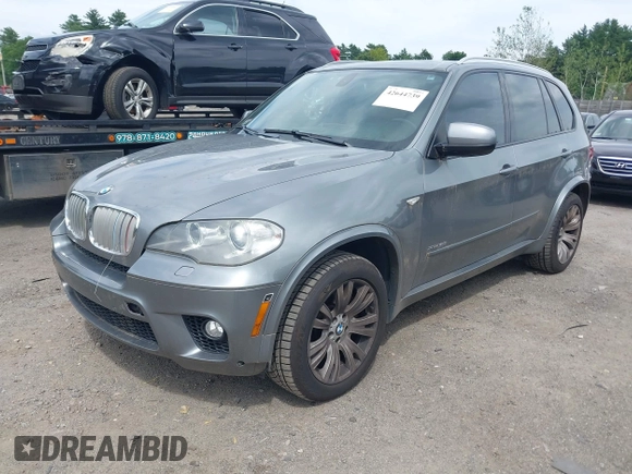 2013 BMW X5 xDrive50i with VIN 5UXZV8C52D0C15272, listed as a IAAI auction lot 42644739 with 169,393 mi miles and . Bid and sale history available at DreamBid. Image 2.