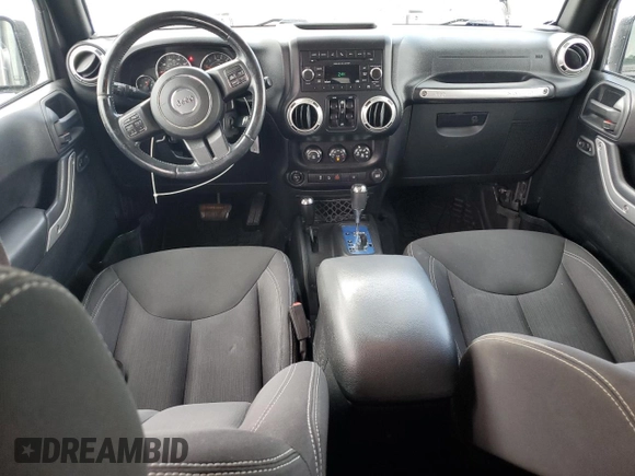 2016 Jeep Wrangler Unlimited 75th Anniversary with VIN 1C4BJWEG3GL216156, listed as a Copart auction lot 62611845 with 87,353 mi miles and Salvage title. Bid and sale history available at DreamBid. Image 8.