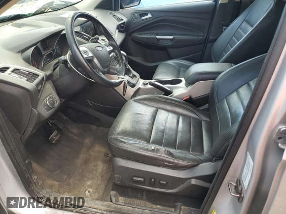 2013 Ford Escape SEL z VIN 1FMCU9H9XDUD00146, wystawiony jako Copart lot #60886165 z przebiegiem 198 557 mil mil oraz Szkoda całkowita • Salvage title. Historia ofert i sprzedaży dostępna na DreamBid. Obrazek 7.