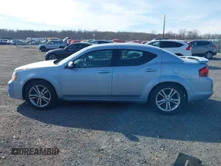 2013 Dodge Avenger SXT with VIN 1C3CDZCB5DN544333, listed as a IAAI auction lot 41655816 with 95,894 mi miles and . Bid and sale history available at carsss.com. Image 14.