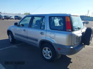 2001 Honda CR-V EX with VIN JHLRD18671C013132, listed as a IAAI auction lot 42057704 with 261,635 mi miles. Bid and sale history available at carsss.com. Image 3.