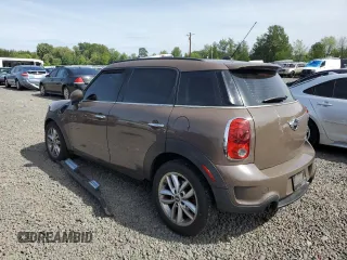 2011 MINI Countryman S with VIN WMWZC3C56BWH97944, listed as a Copart auction lot 58071315 with 176,528 mi miles and Clean title. Bid and sale history available at DreamBid. Image 2.