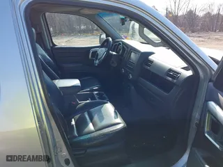 2006 Honda Ridgeline RTL with VIN 2HJYK16576H555999, listed as a IAAI auction lot 42023875 with 202,128 mi miles. Bid and sale history available at carsss.com. Image 5.