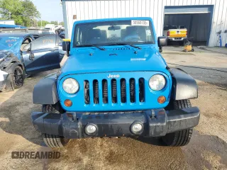 2012 Jeep Wrangler Sport with VIN 1C4AJWAG3CL144015, listed as a Copart auction lot 50969705 with 93,417 mi miles and Salvage title. Bid and sale history available at DreamBid. Image 5.