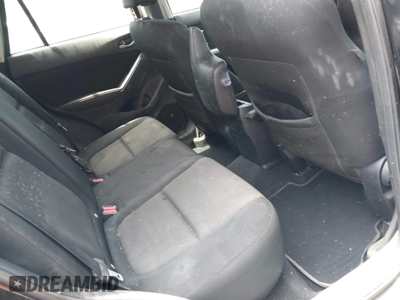 2016 Mazda CX-5 Sport with VIN JM3KE2BY8G0847018, listed as a IAAI auction lot 42064726 with 69,017 mi miles and . Bid and sale history available at DreamBid. Image 8.
