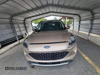 2020 Ford Escape Titanium Hybrid with VIN 1FMCU0DZ5LUB81972, listed as a IAAI auction lot 42679188 with 19,400 mi miles and . Bid and sale history available at DreamBid. Image 4.