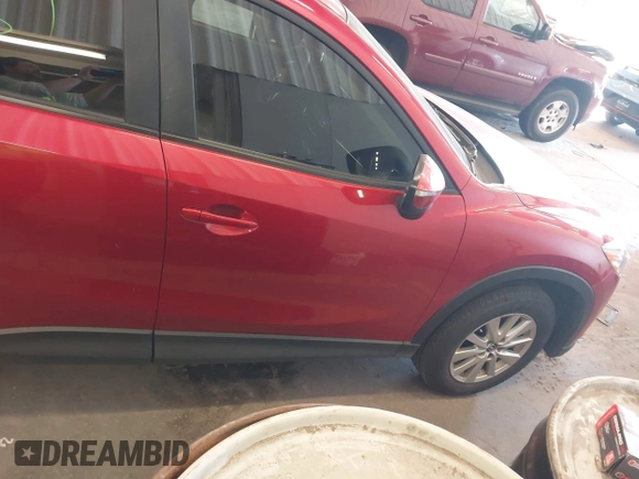 2016 Mazda CX-5 Sport z VIN JM3KE2BY3G0684861, wystawiony jako IAAI lot #42050897 z przebiegiem 165 688 mil mil oraz . Historia ofert i sprzedaży dostępna na DreamBid. Obrazek 14.