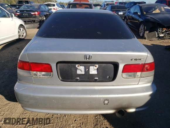 1999 Honda Civic DX with VIN 1HGEJ612XXL034351, listed as a Copart auction lot 76589714 with 192,975 mi miles and Salvage Title. Bid and sale history available at carsss.com. Image 6.