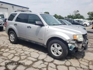 2008 Ford Escape XLT with VIN 1FMCU93128KA16982, listed as a Copart auction lot 58674645 with 214,331 mi miles and Salvage title. Bid and sale history available at DreamBid. Image 4.
