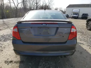 2012 Ford Fusion SE with VIN 3FAHP0HA4CR275893, listed as a Copart auction lot 52882725 with 192,725 mi miles and Salvage Title. Bid and sale history available at DreamBid. Image 6.