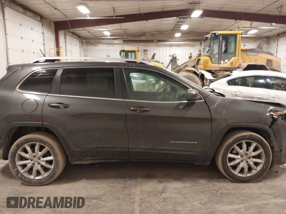 2015 Jeep Cherokee Limited with VIN 1C4PJLDS2FW643738, listed as a IAAI auction lot 41719033 with 102,630 mi miles and . Bid and sale history available at DreamBid. Image 13.