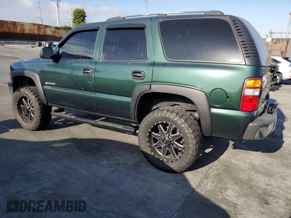 2003 Chevrolet Tahoe LS with VIN 1GNEC13V53R101245, listed as a Copart auction lot 65222214 with 259,040 mi miles and Salvage Title. Bid and sale history available at carsss.com. Image 2.