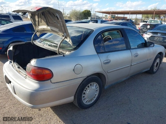 2004 Chevrolet Classic with VIN 1G1ND52F34M589464, listed as a IAAI auction lot 41566346 with 128,084 mi miles. Bid and sale history available at carsss.com. Image 4.