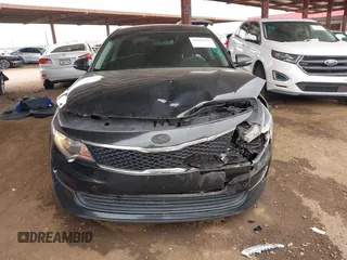 2016 Kia Optima LX with VIN KNAGT4L32G5111503, listed as a IAAI auction lot 42011975 with 114,476 mi miles. Bid and sale history available at carsss.com. Image 6.