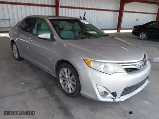 2014 Toyota Camry Hybrid LE with VIN 4T1BD1FK6EU128766, listed as a IAAI auction lot 42004487 with 280,013 mi miles. Bid and sale history available at carsss.com. Image 1.