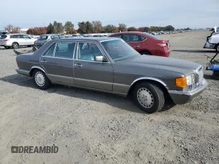 1990 Mercedes-Benz 560 with VIN WDBCA39E3LA553622, listed as a Copart auction lot 81530904 with 142,614 mi miles and Clean Title. Bid and sale history available at DreamBid. Image 4.