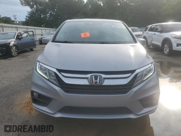 2018 Honda Odyssey EX-L with VIN 5FNRL6H74JB099282, listed as a Copart auction lot 55031025 with 137,359 mi miles and Salvage Title. Bid and sale history available at DreamBid. Image 5.