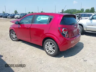 2012 Chevrolet Sonic LT with VIN 1G1JC6SH7C4135418, listed as a IAAI auction lot 42464564 with 169,035 mi miles and . Bid and sale history available at DreamBid. Image 3.