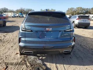 2024 Cadillac XT4 FWD Sport with VIN 1GYFZER40RF249101, listed as a Copart auction lot 76312304 with 1,969 mi miles and Salvage title. Bid and sale history available at DreamBid. Image 6.